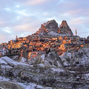Sunset over Uchisar, with a breathtaking view of Göreme National Park