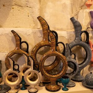 Handmade ceramic pots displayed in an Avanos workshop