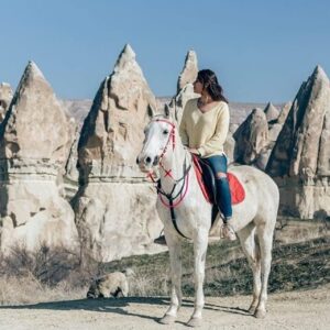 Horseback riding adventure in Cappadocia with panoramic views of rock formations
