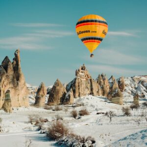 Watch the sunrise from a hot air balloon in Cappadocia