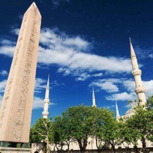 Walk through the Hippodrome—once the roaring arena of ancient Constantinople